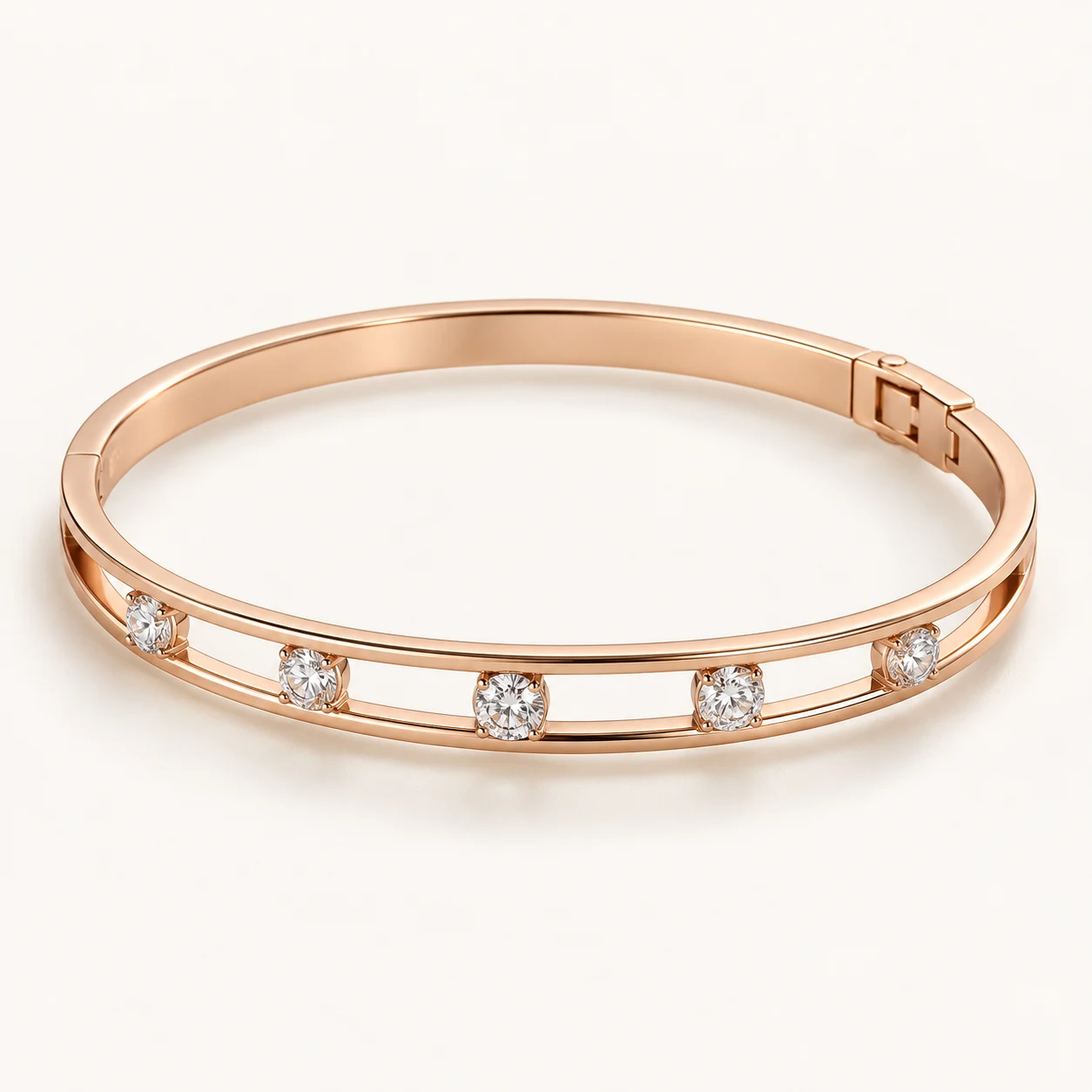 Opaline Duo in Rose Gold, hinged oval bangle, two parallel slim metal rails with five spaced round clear cubic zirconia between them on the front