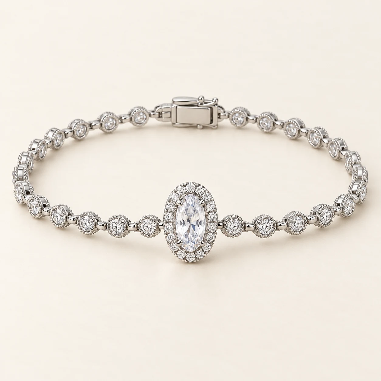 Maison Halo in Silver, articulated bracelet, one central oval clear cubic zirconia surrounded by small round clear cubic zirconia halo, side links small round clear cubic zirconia, box clasp