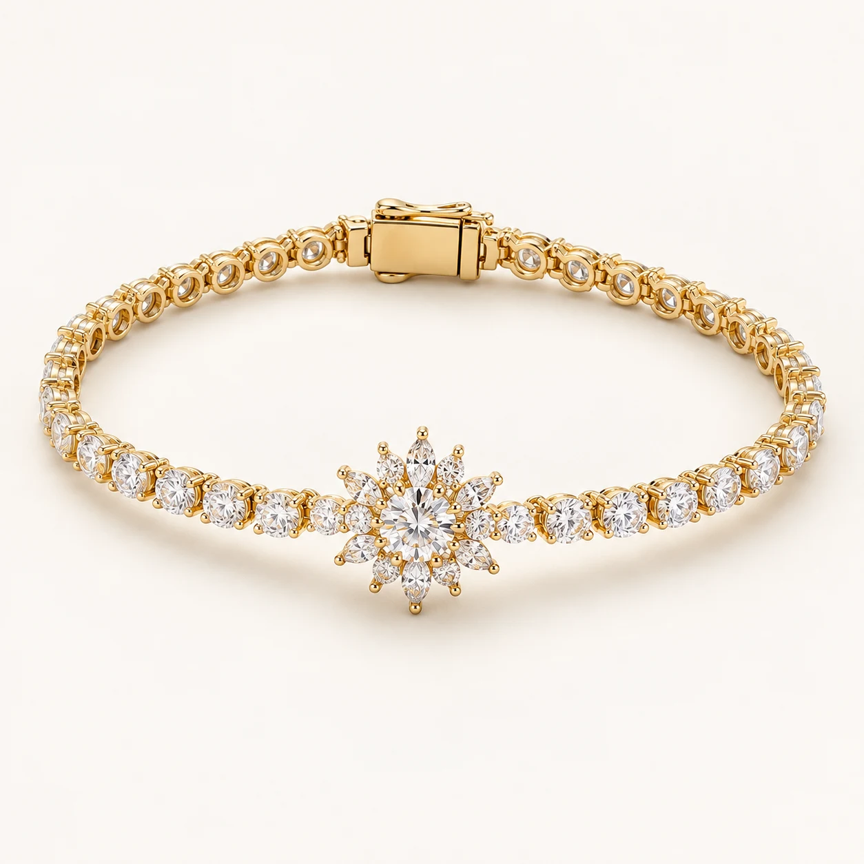 Étoile Gala in Gold, bracelet, central radiating starburst cluster of clear cubic zirconia, narrow articulated round clear cubic zirconia side links, box clasp