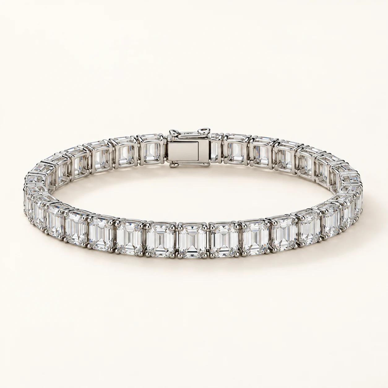 Élise Emerald in Silver, tennis bracelet, continuous row of rectangular EMERALD CUT clear cubic zirconia, box clasp